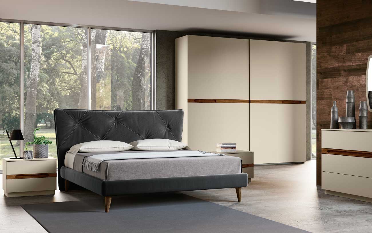 camera da letto matrimoniale con armadio ante scorrevoli comò e comodini coordinati