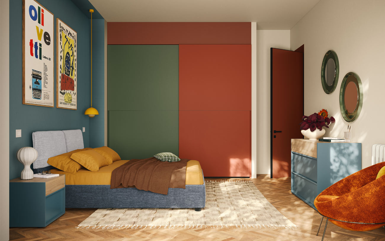Camera da letto colorata con letto matrimoniale con contenitore Pensarecasa